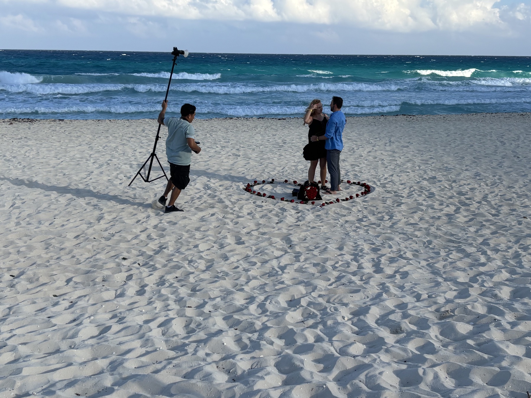 Lighting team and couple inside a rose heart