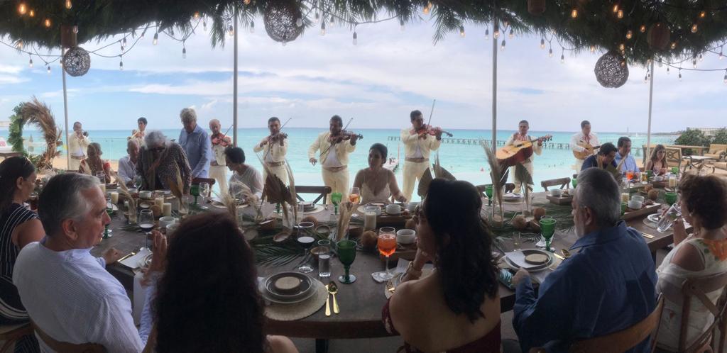 Professional mariachi performing by the Caribbean Sea in Cancun